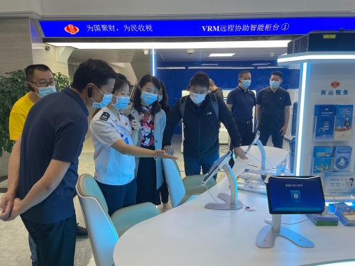 2022年7月1日对西山区优化提升营商环境工作进行调研。